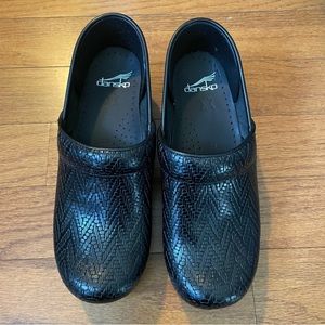 Beautiful tooled black leather Dansko clogs, size 39, never used.